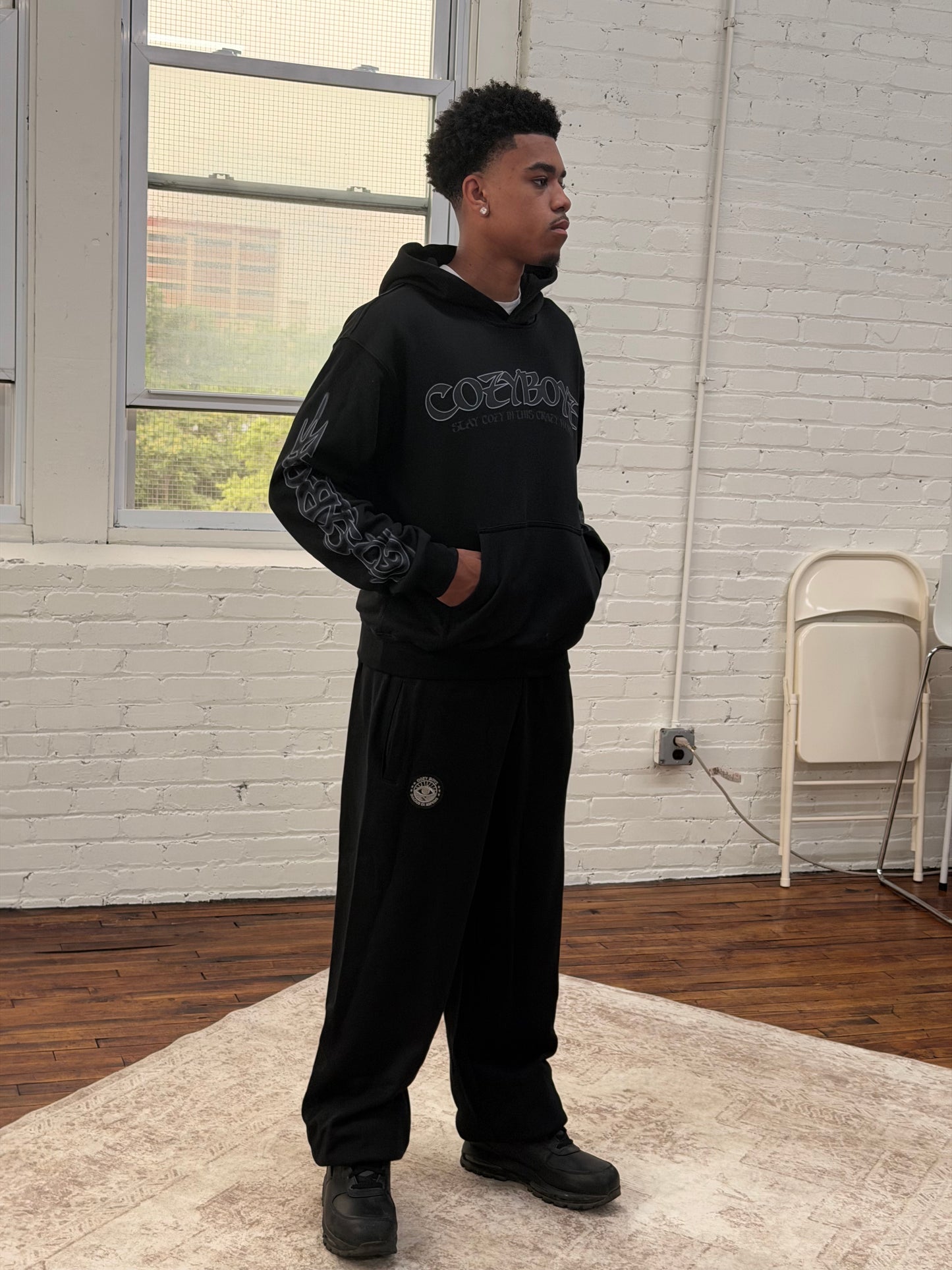 Cozyboyz black sweatsuits